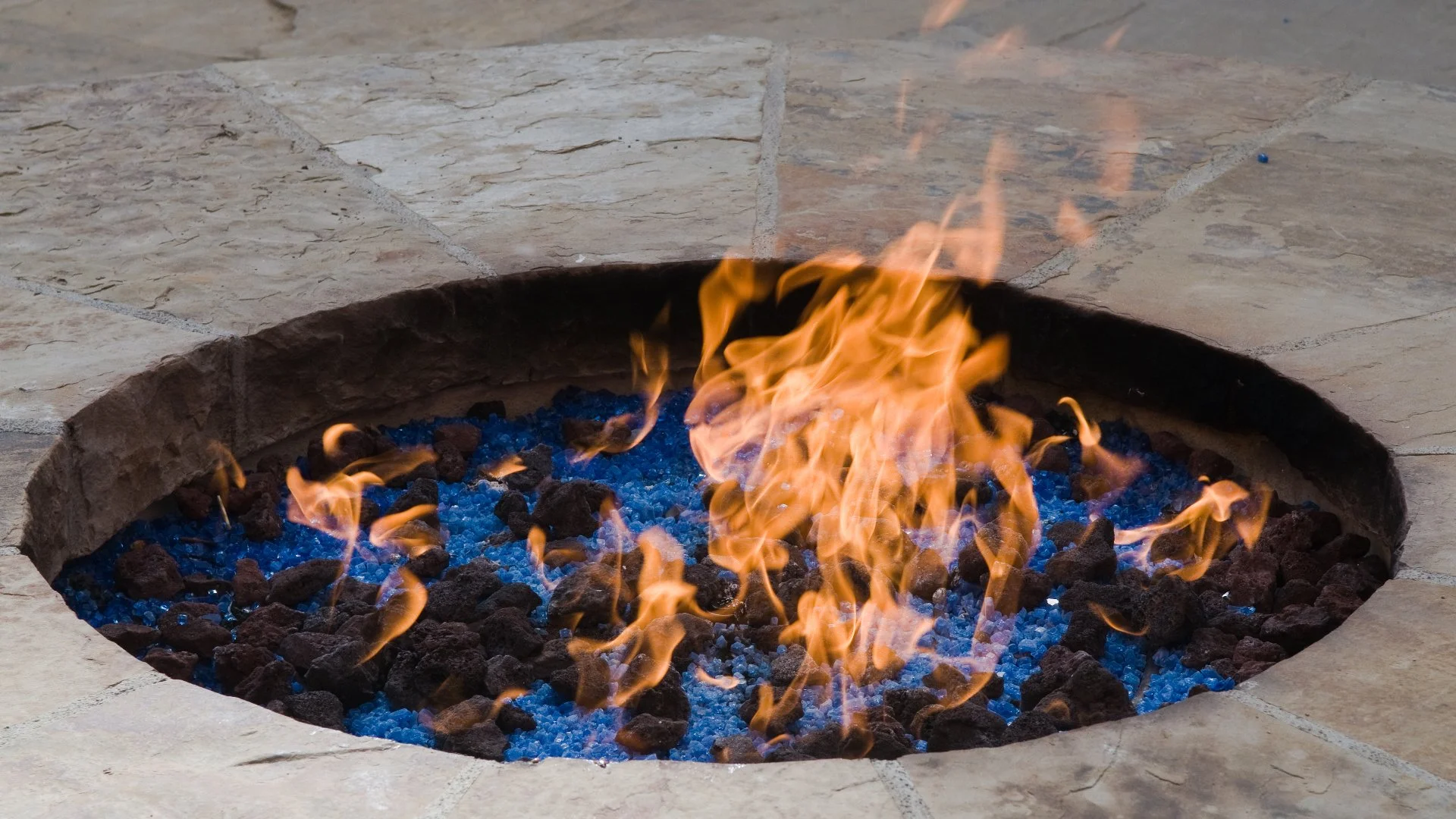 Deciding Between a Fire Pit & Outdoor Fireplace? Consider These Things!