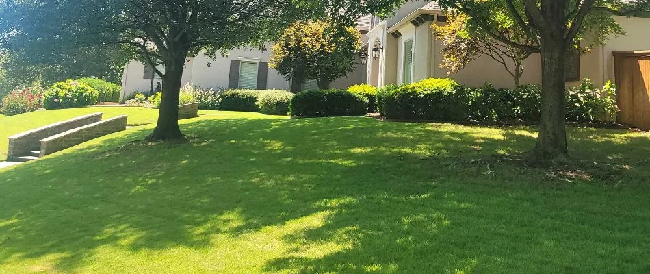 Home in Tulsa, OK, with a healthy lawn.