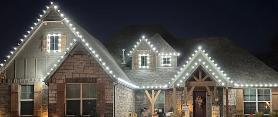 Holiday lights on the eaves of a house in Tulsa, OK.