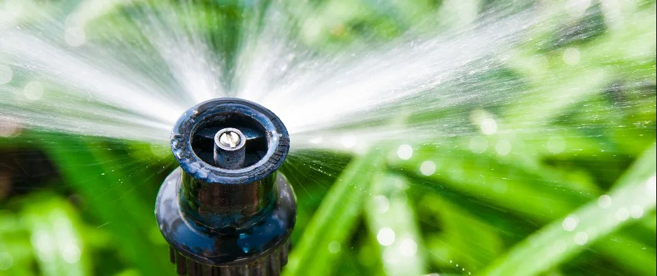 Sprinkler system spraying water in Sperry, OK.